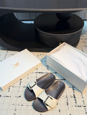 THE ROW 26S BUCKLE SLIDE SANDALS IN WHITE CALFSKIN