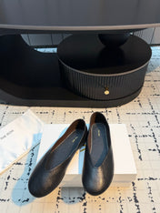 THE ROW 26S CLASSIC BALLET FLATS IN BLACK CALFSKIN
