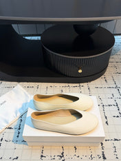 THE ROW 26S CLASSIC BALLET FLATS IN IVORY WHITE CALFSKIN