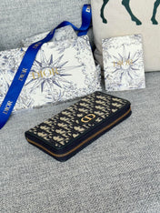 MONTAIGNE VOYAGEUR LONG WALLET 20 IN BLACK MONOGRAM OBLIQUE JACQUARD
