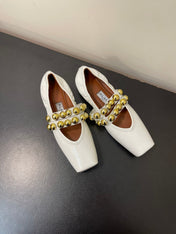 ALAIA BALLET FLATS IN WHITE GLOSSY CALFSKIN WITH GOLD HARDWARE
