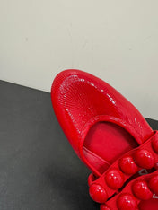 ALAIA SPHERE BALLET FLATS IN CHERRY RED LAMBSKIN