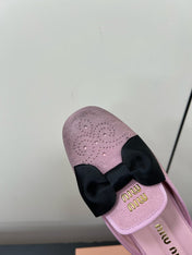 BOW MULES IN DUST PINK SUEDE