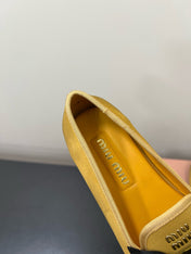 LOAFERS WITH BOW IN DUST YELLOW SUEDE
