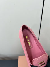 LOAFERS WITH BOW IN PINK SHEEPSKIN