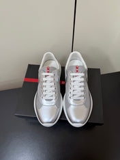 PRADA 26S SNEAKERS IN SILVER CALFSKIN AND WHITE MESH