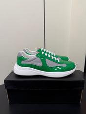 PRADA 26S SNEAKERS IN GREEN PATENT CALFSKIN AND WHITE MESH