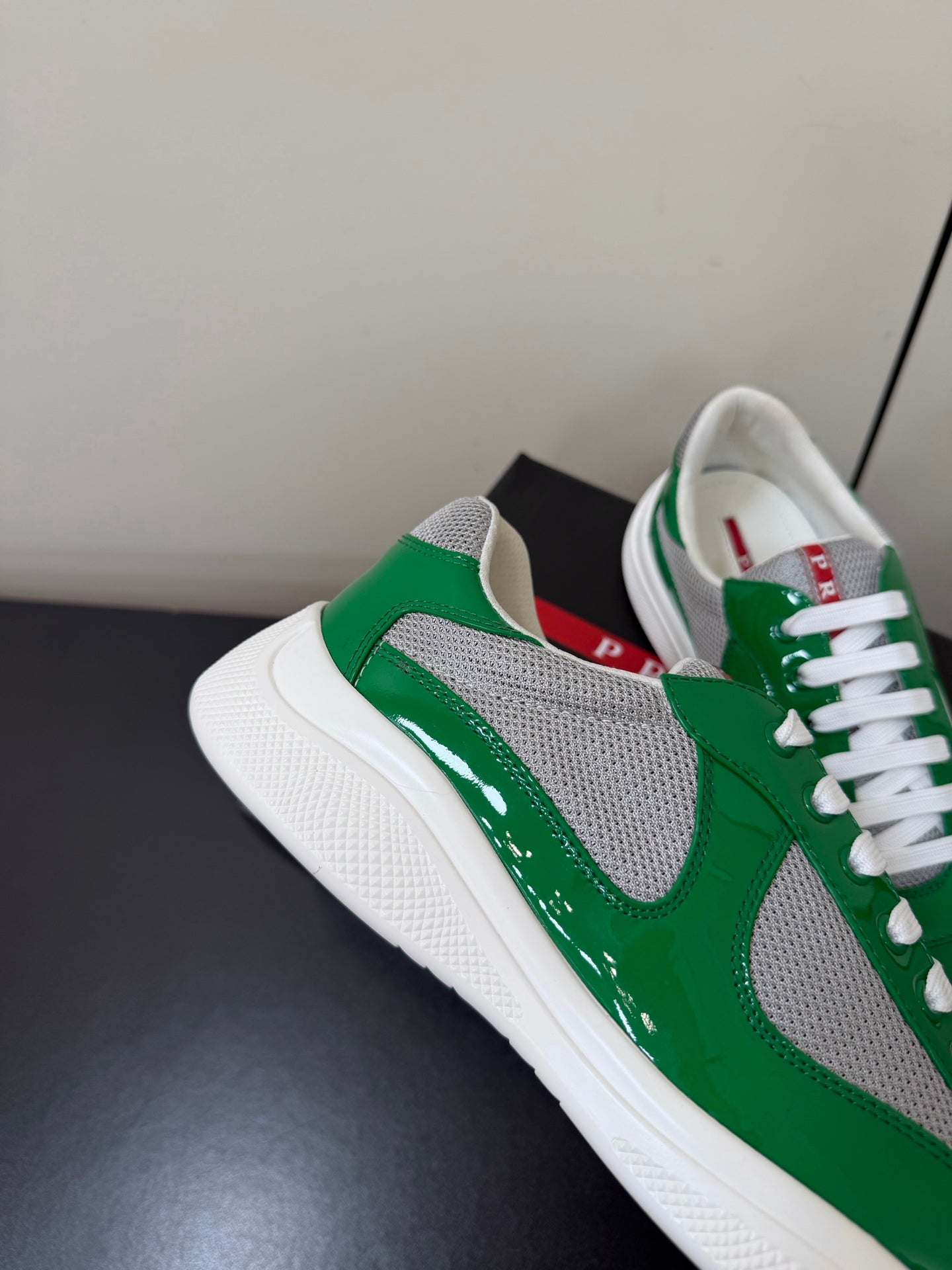 PRADA 26S SNEAKERS IN GREEN PATENT CALFSKIN AND WHITE MESH
