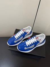 PRADA 26S SNEAKERS IN DARK BLUE PATENT CALFSKIN AND WHITE MESH