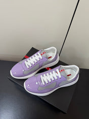 PRADA 26S SNEAKERS IN LIGHT PLUM PATENT CALFSKIN AND WHITE MESH