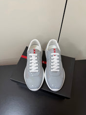 PRADA 26S SNEAKERS IN LIGHT GRAY PATENT CALFSKIN AND WHITE MESH