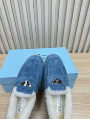 LOAFER IN AZURE BLUE SUEDE AND FUR LINING ATTACHED TRIANGLE LOGO