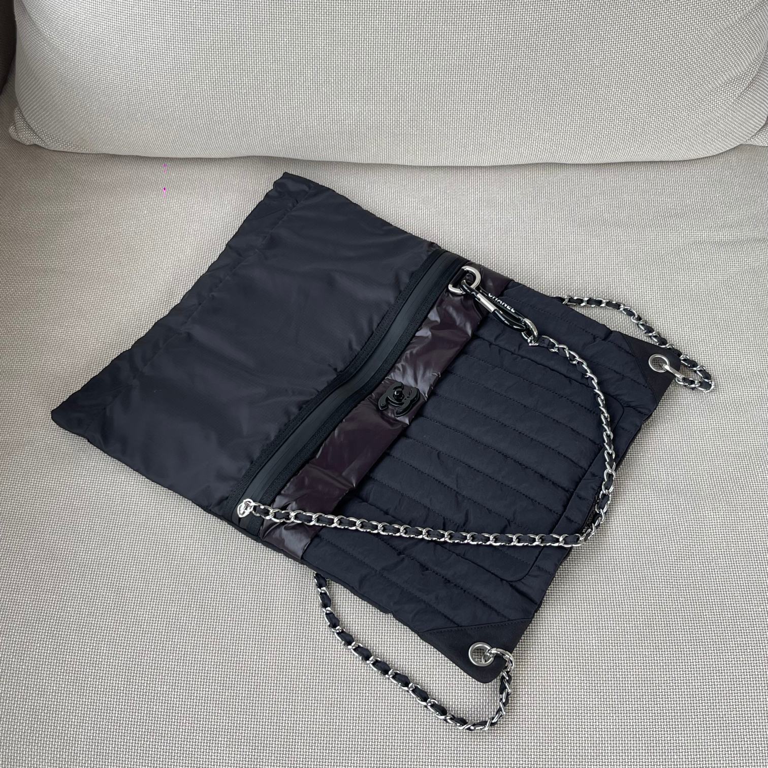 CHANEL 26S DRAWSTRING BACKPACK 44 IN BLACK PUFFY QUILTED NYLON
