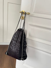 CHANEL 26S DRAWSTRING BACKPACK 44 IN BLACK PUFFY QUILTED NYLON