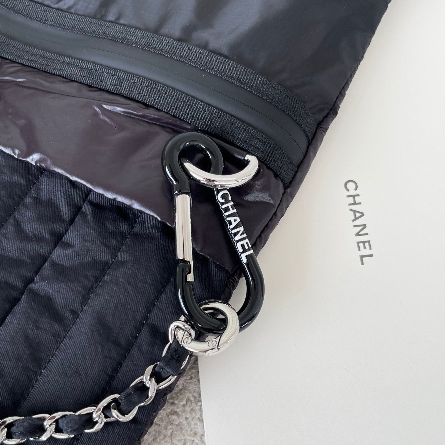 CHANEL 26S DRAWSTRING BACKPACK 44 IN BLACK PUFFY QUILTED NYLON