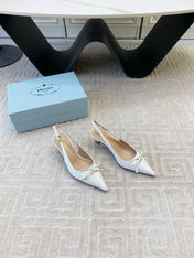 SLINGBACK PUMPS ATTACHED BOW IN WHITE GLOSSY CALFSKIN