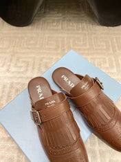 TASSEL MULES IN RUSSET BROWN LAMBSKIN