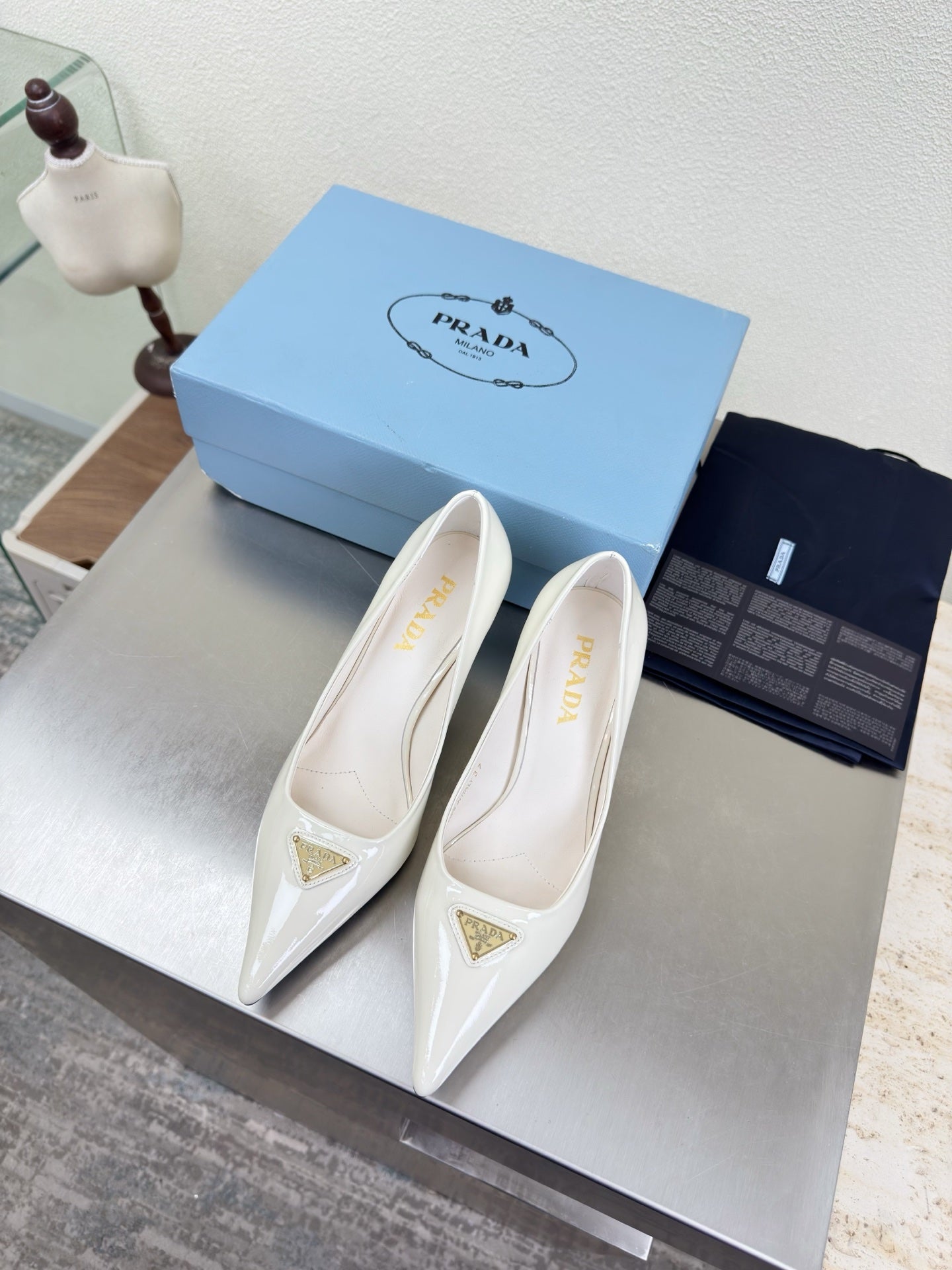 PRADA 26S POINTED TOE PUMPS 75MM IN WHITE PATENT CALFSKIN
