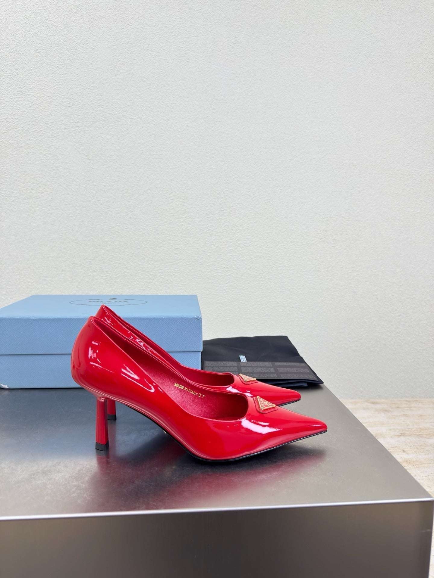 PRADA 26S POINTED TOE PUMPS 75MM IN RED PATENT CALFSKIN