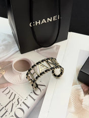 CHANEL 26S CHANEL LOGO OPEN CUFF LEATHER CHAIN BRACELET IN GOLD METAL 630836