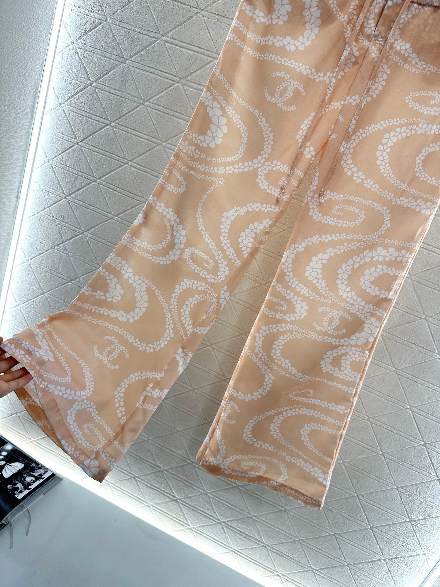 CHANEL BEIGE PRINTED DENIM PANTS