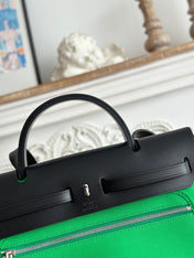 ZIP CABINE 31 BAG IN EMERALD GREEN CANVAS AND BLACK CALFSKIN
