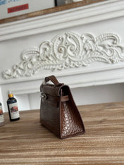 HM 26S KELLY MINI 22MM IN DARK BROWN CROC EMBOSSED CALFSKIN SILVER KELLY BUCKLE
