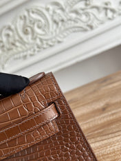 HM 26S KELLY MINI 22MM IN DARK BROWN CROC EMBOSSED CALFSKIN SILVER KELLY BUCKLE