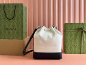 DRAWSTRING SHOULDER BAG LOGO PRINT 31 IN WHITE CANVAS DARK BLUE CALFSKIN