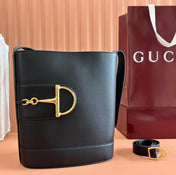 73 MEDIUM BUCKET BAG 27.5 IN BLACK SMOOTH CALFSKIN