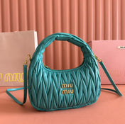 WANDER MATELASSÉ HANDBAG 23 IN LAGOON BLUE LAMBSKIN
