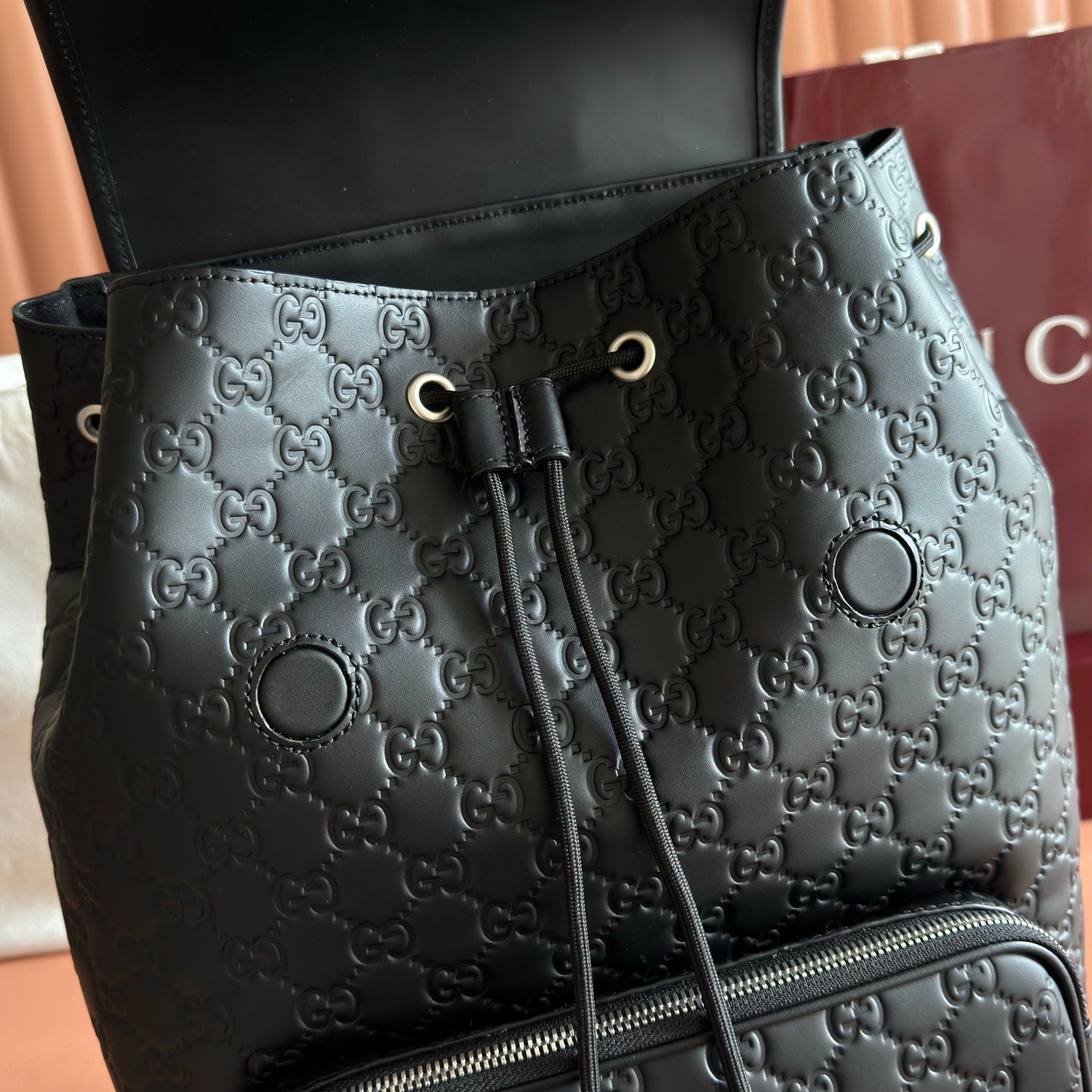 GUCCI 26S GG EMBLEM BACKPACK 44 IN BLACK EMBOSSED CALFSKIN