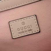 GUCCI 26S GG EMBLEM BUCKET BAG 25 IN LIGHT PINK COATED FABRIC