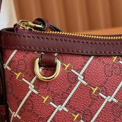 GUCCI 26S GG EMBLEM BUCKET BAG 22 IN DARK RED COATED FABRIC