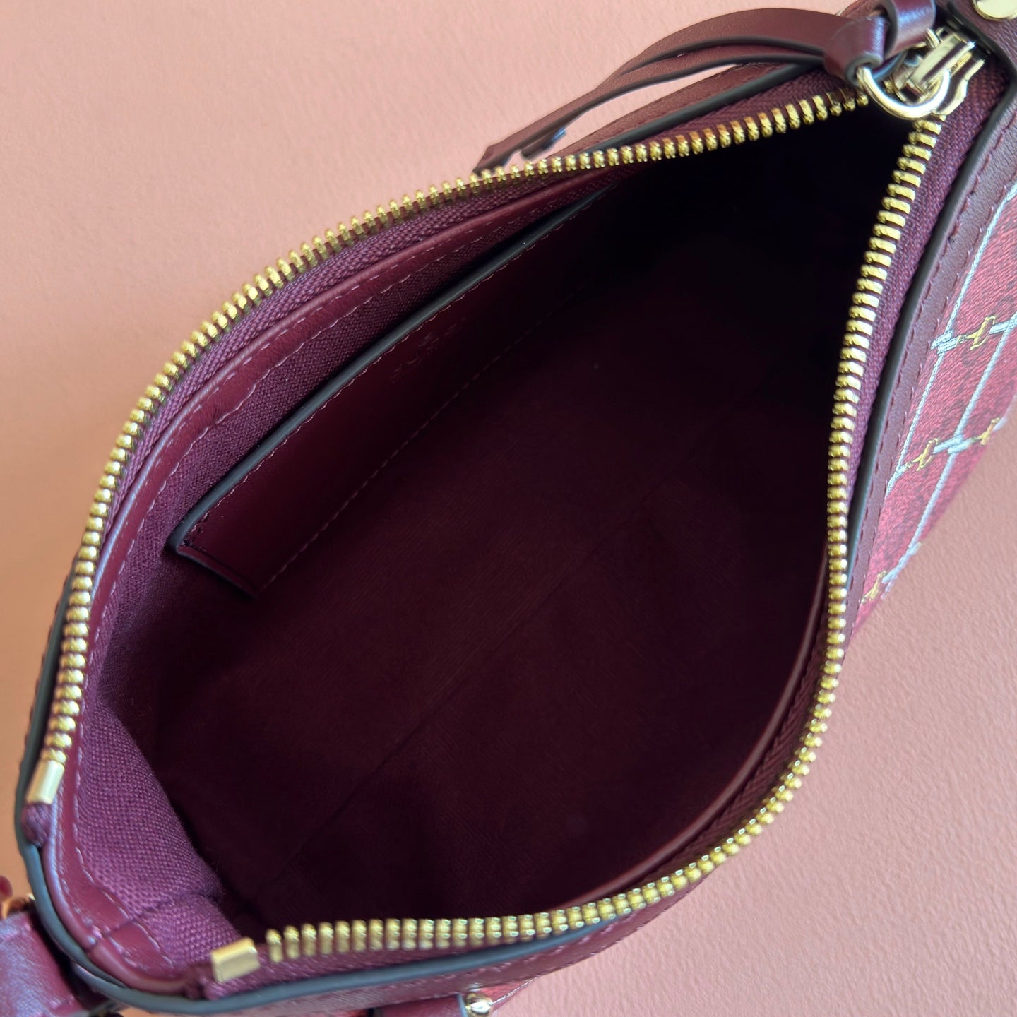 GUCCI 26S GG EMBLEM BUCKET BAG 22 IN DARK RED COATED FABRIC