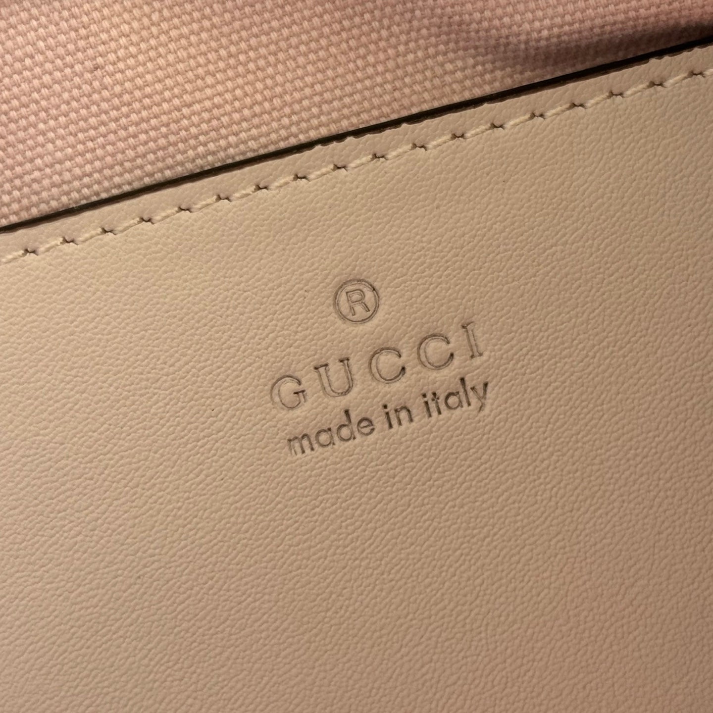 GUCCI 26S GG EMBLEM BUCKET BAG 22 IN LIGHT PINK COATED FABRIC
