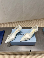 PRADA 26S POINTED TOE CUT OUT HIGH HEELS 75MM IN WHITE CALFSKIN WITH BOW