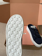 WASH SNEAKER MULES IN DARK NAVY DENIM