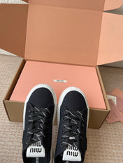 WASH SNEAKER MULES IN BLACK DENIM