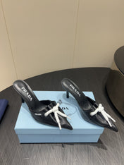 PRADA 25S BRAIDED DETAIL MULES 85MM IN BLACK CALFSKIN