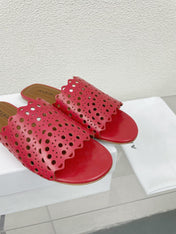 ALAIA VIENNE FLAT MULES IN CHERRY RED LAMBSKIN