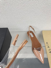 ALAIA LE COEUR FLAT SLINGBACKS IN BEIGE PATENT LAMBSKIN