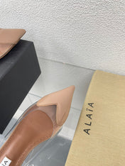 ALAIA LE COEUR FLAT SLINGBACKS IN BEIGE PATENT LAMBSKIN