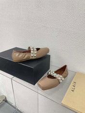ALAIA MARY JANE PEARL IN GLOSSY BEIGE LAMBSKIN