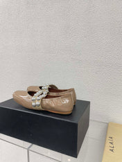 ALAIA MARY JANE PEARL IN GLOSSY BEIGE LAMBSKIN