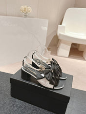 HIGH SANDAL WITH PEARL CHAIN BLACK LAMBSKIN WITH WHITE RHINESTONES
