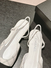 SLINGBACKS IN WHITE LAMBSKIN AND BLACK SATIN