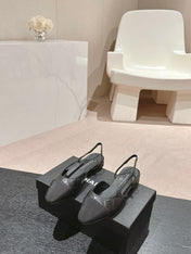 SLINGBACKS IN BLACK LAMBSKIN AND SATIN