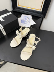 MID HEEL SANDALS IN WHITE CALFSKIN WITH BOW