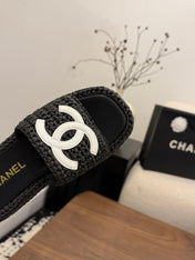 CHANEL 26S PLATFORM SLIDES 40 MM IN BLACK WOVEN RAFFIA